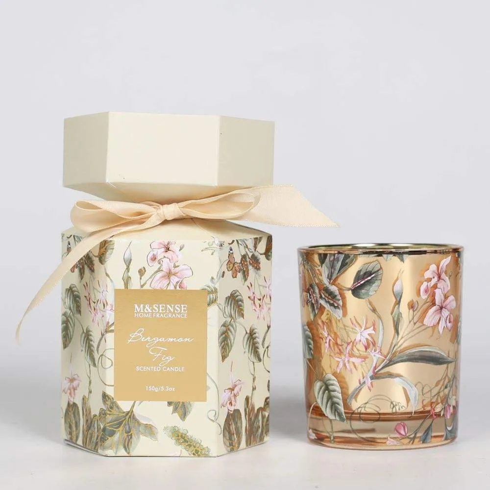 Gold decorated glass candle with ribbon gift box