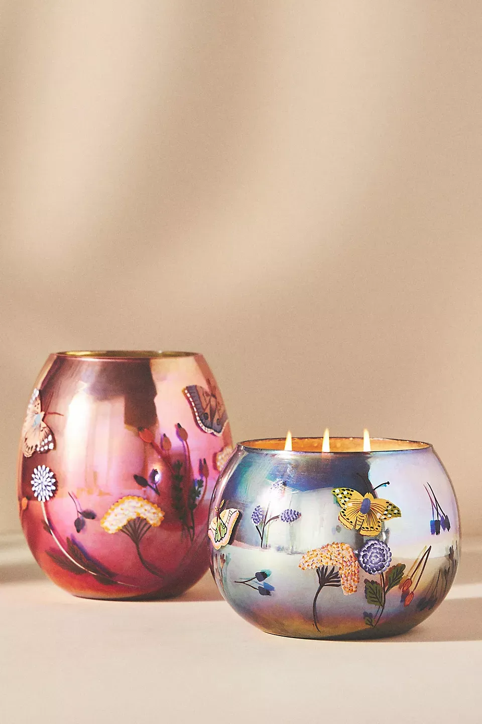 Hand-painted iridescent glass candle vessels