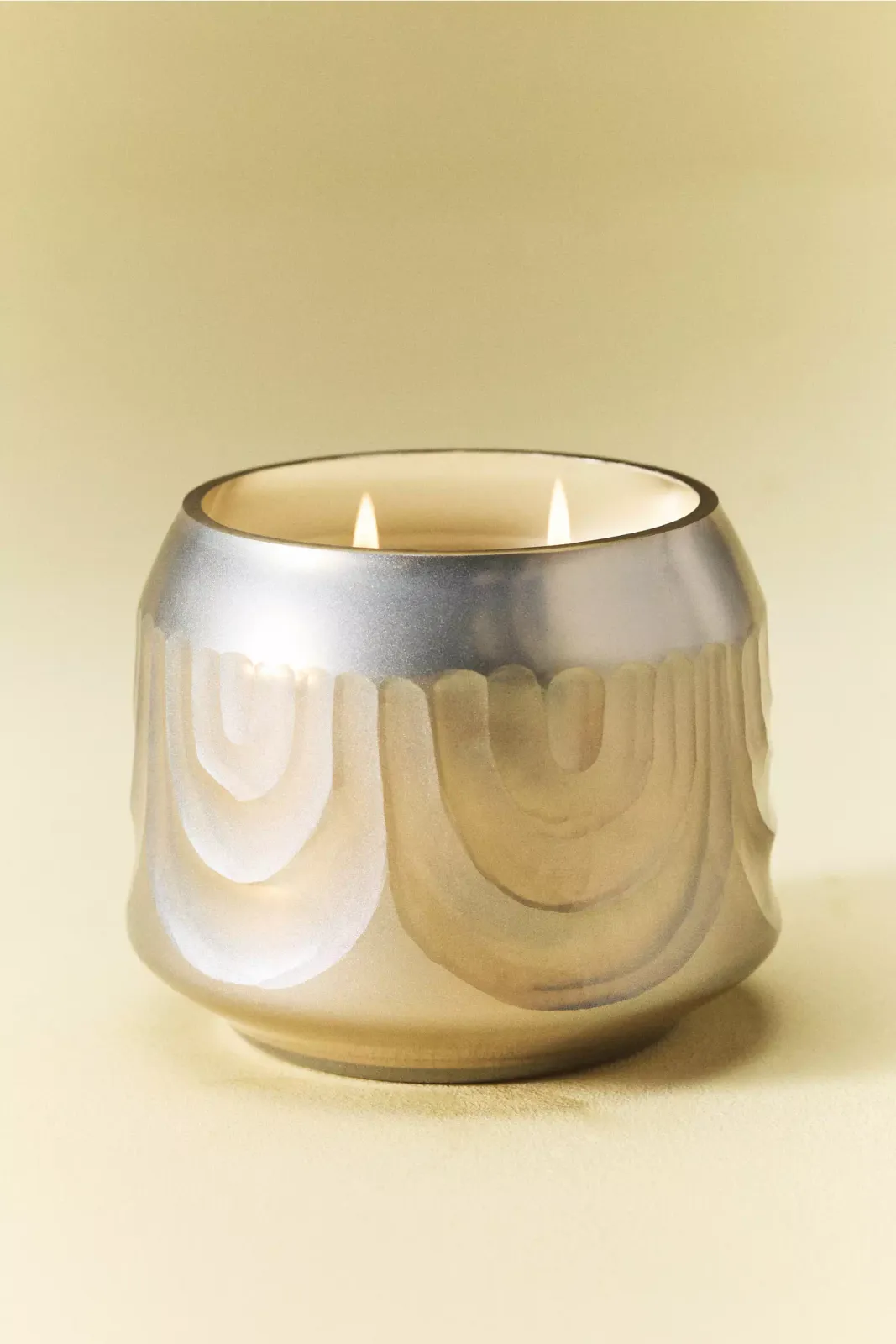 Silver metallized glass candle vessel